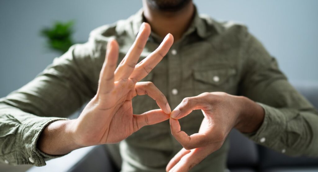 The Importance of Sign Language Interpreting: What Is It and Why Does It Matter? cover